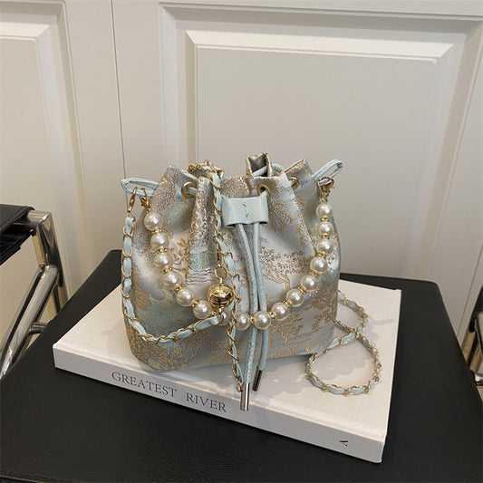 Textured and Embroidered Shoulder Bag