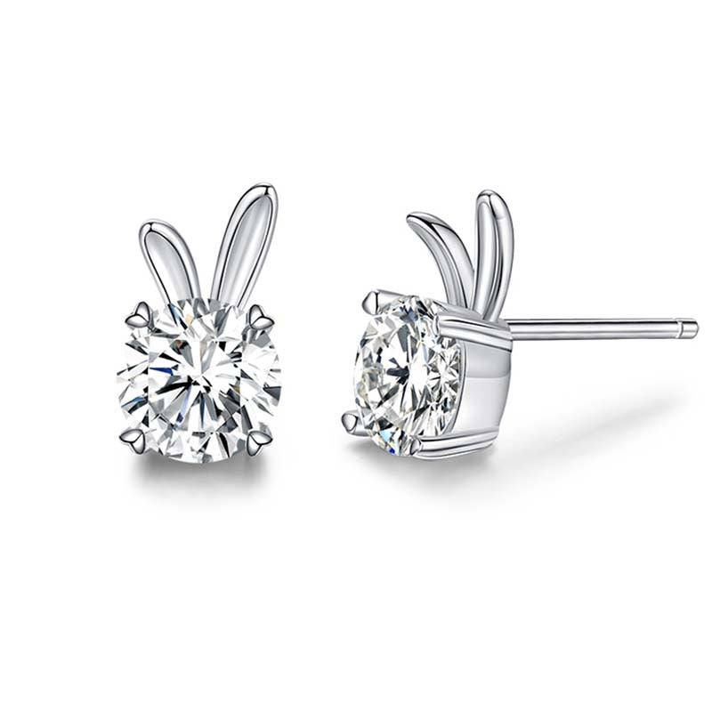 Pair of diamond stud earrings on a white background