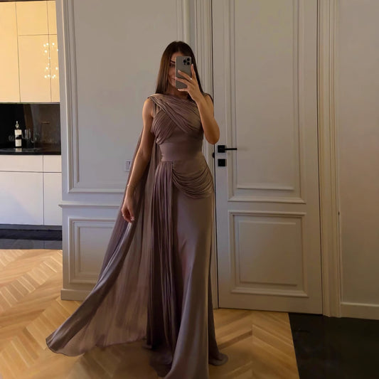 Pleated Gown with side cape in satin