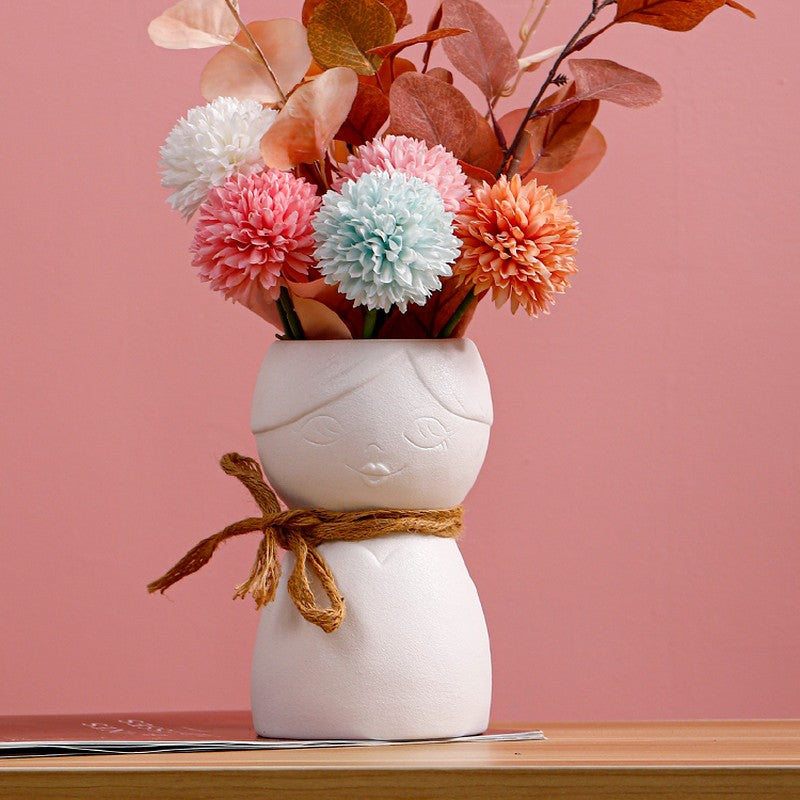 Porcelain Face Vase On Porch Table