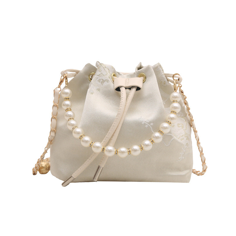 Textured and Embroidered Shoulder Bag