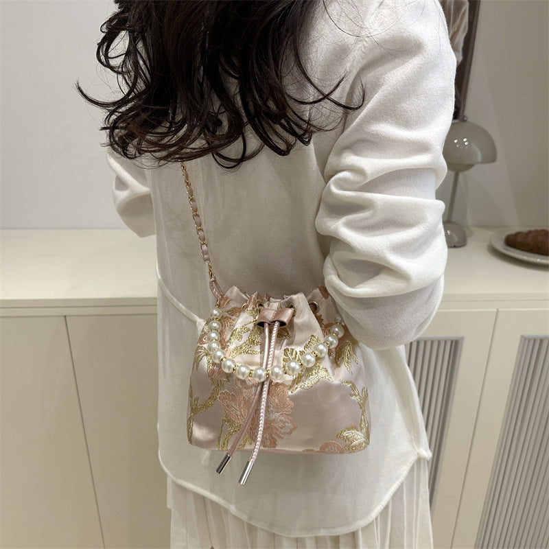 Textured and Embroidered Shoulder Bag