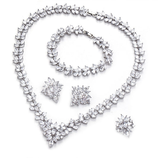 The Dazzling Set Is Handcrafted With Copper And Set With Zircon Stones.