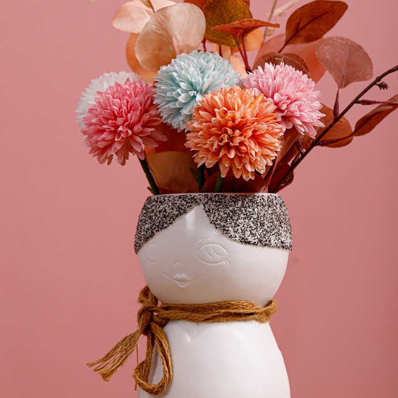 Porcelain Face Vase On Porch Table