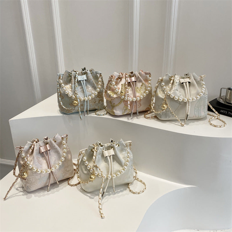 Textured and Embroidered Shoulder Bag
