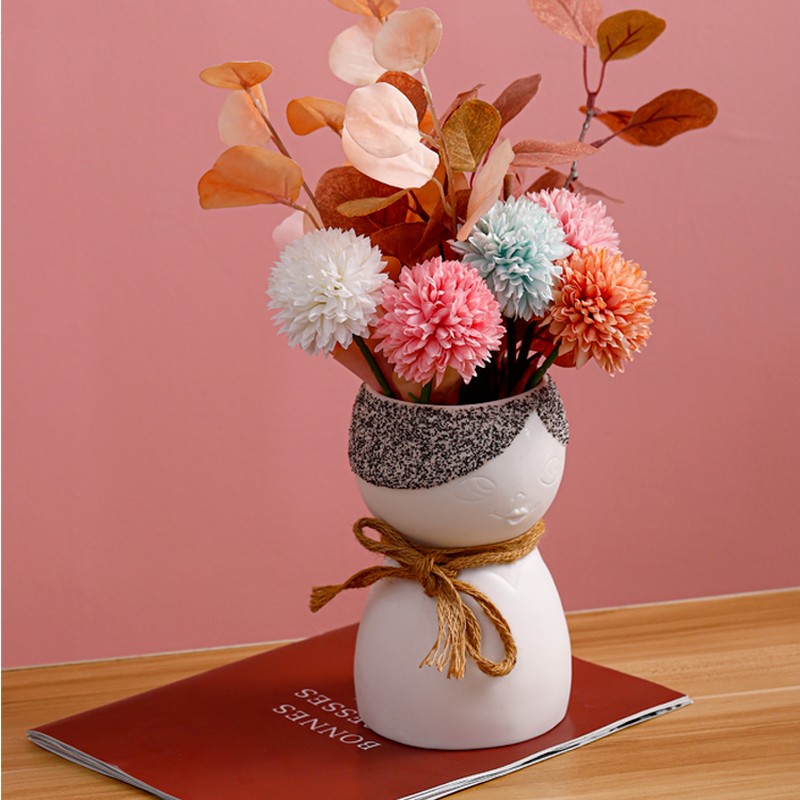 Porcelain Face Vase On Porch Table